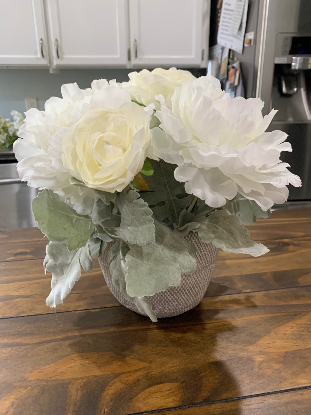 Cute faux floral grey with white faux flowers arrangement